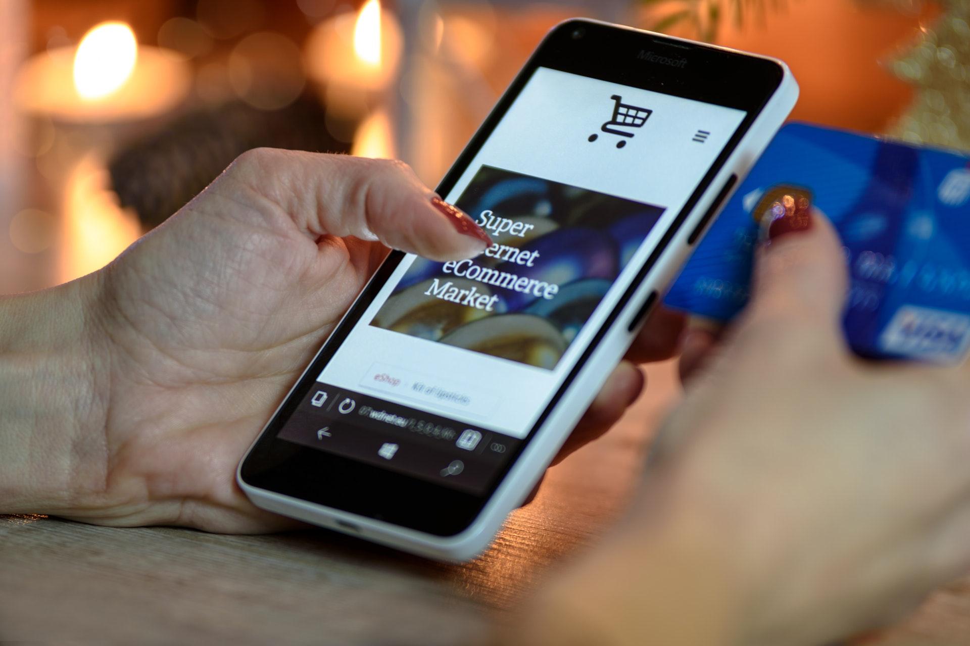 Woman shopping on smart phone